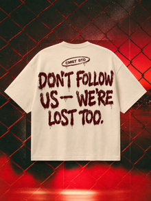 Don't Follow Us — We're Lost Too oversized tee in ivory with oxblood back print