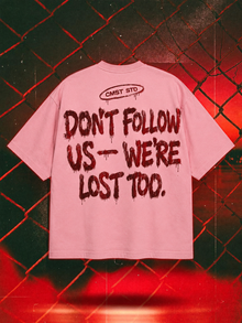 Don't Follow Us — We're Lost Too oversized tee in pink with burgundy back print